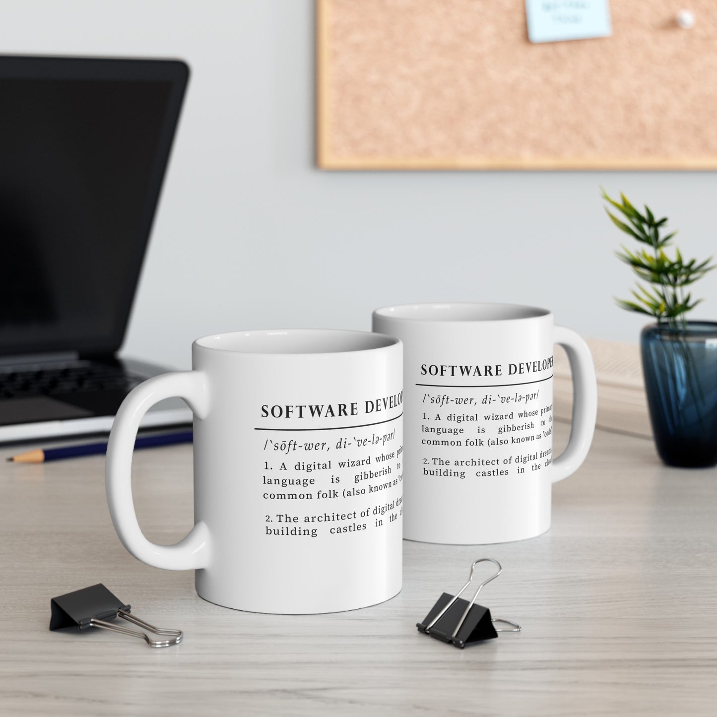 The image showcases a white ceramic mug with a whimsical definition of 'Software Developer' printed in black. The text highlights the developer as a digital wizard and an architect of digital dreams, using a clever tone to describe coding as a mysterious language.