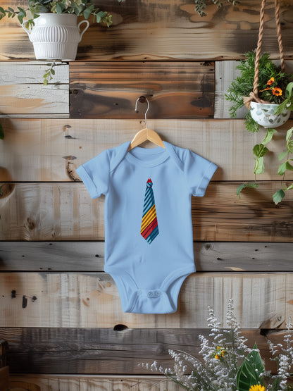 a baby bodysuit with a colorful tie on it