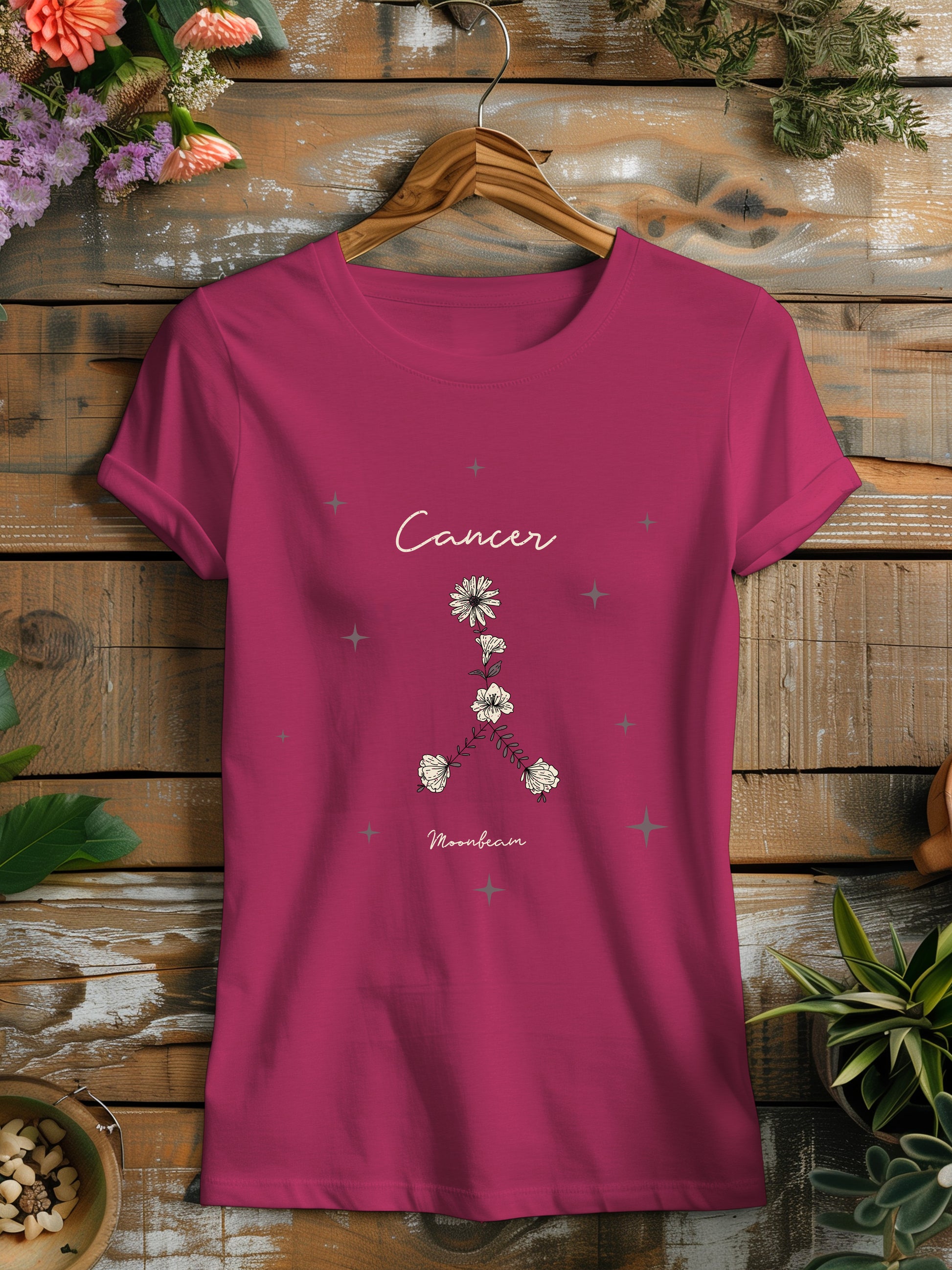 a pink t - shirt that says cancer on it