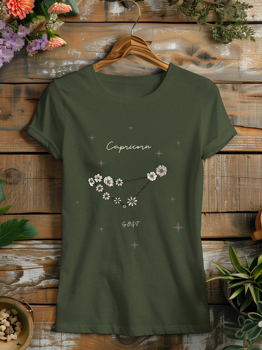 a green t - shirt with flowers on it