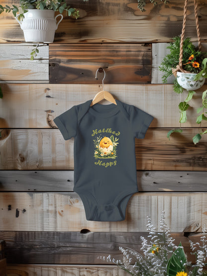 Baby Onesie with a smiling chick in an egg shell with text hatched happy.