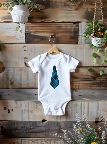 a baby bodysuit with a blue tie on it