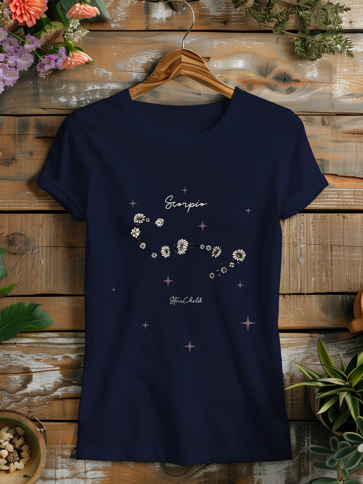 a women's t - shirt with the zodiac sign on it