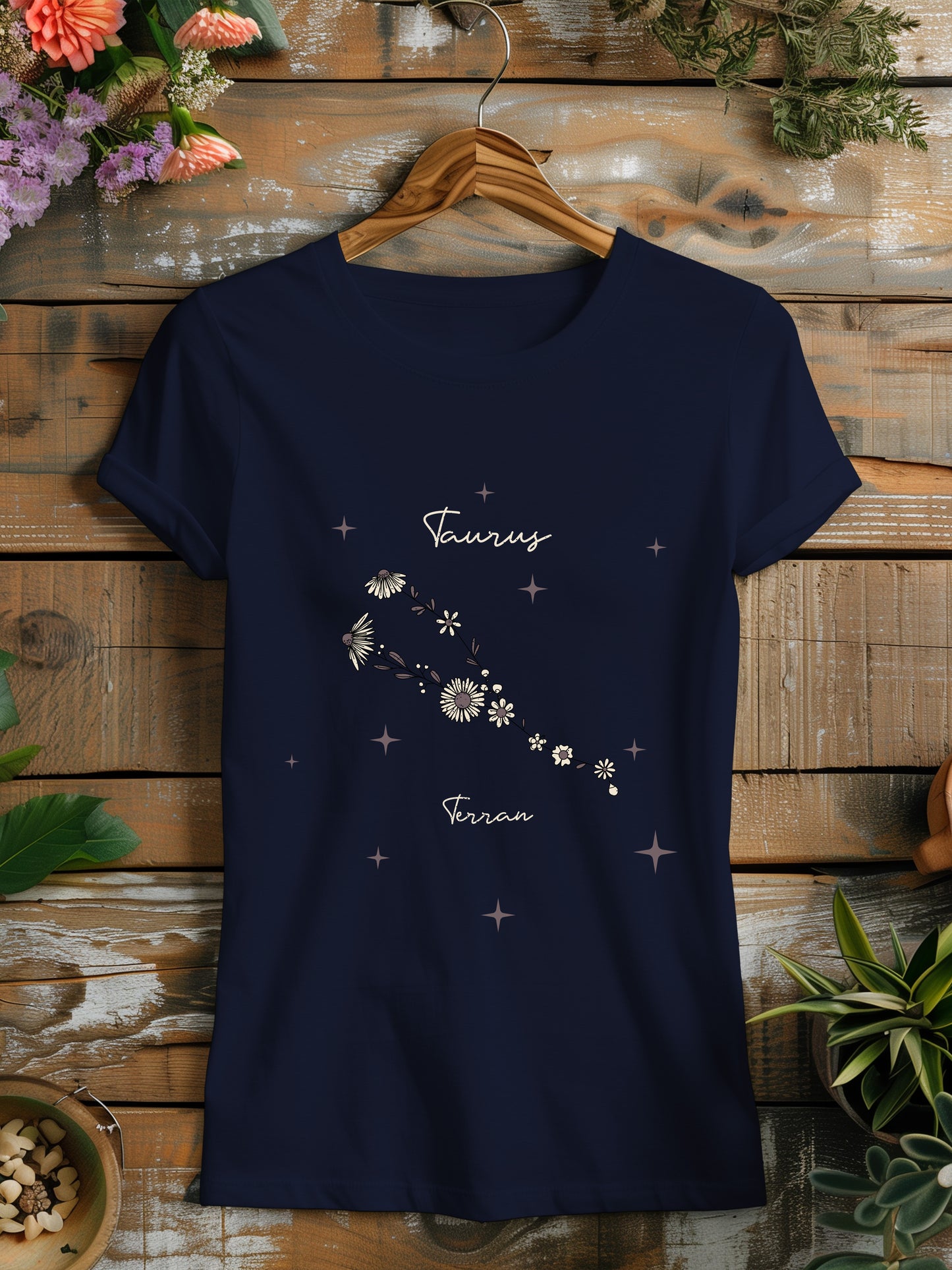 a women's t - shirt with a picture of the zodiac sign