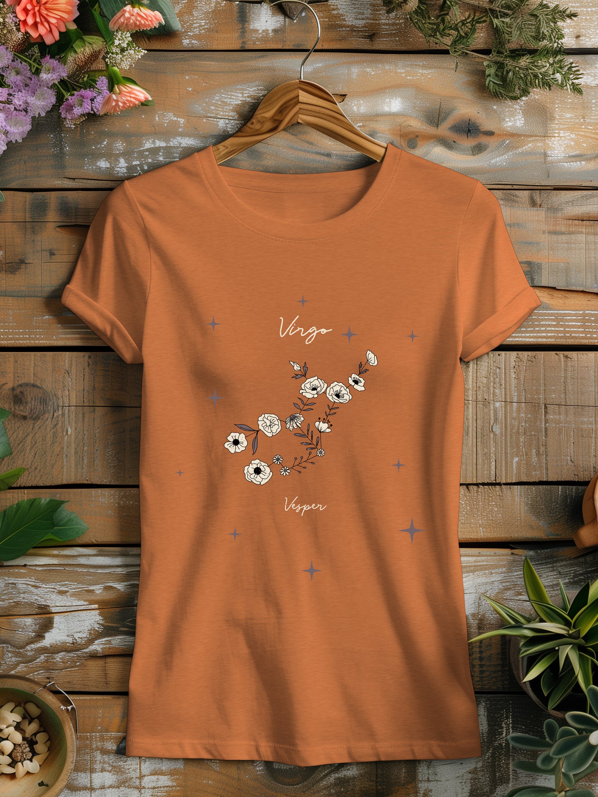 a women's t - shirt with flowers on it