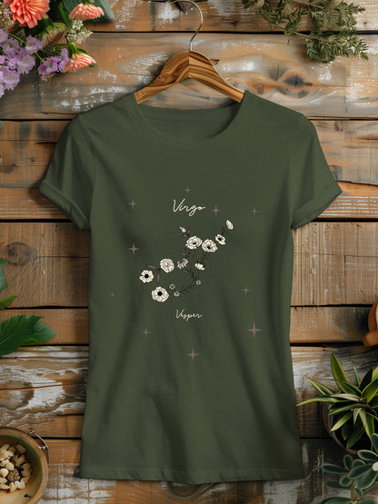 a green t - shirt with white flowers on it