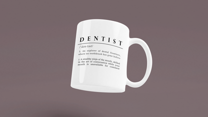 A white ceramic mug printed with black text that humorously defines 'DENTIST' as both an explorer of dental frontiers and a stealthy ninja of the mouth. 